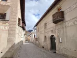 Above every town are the snow-capped and very high peaks of the Swiss Dolomites